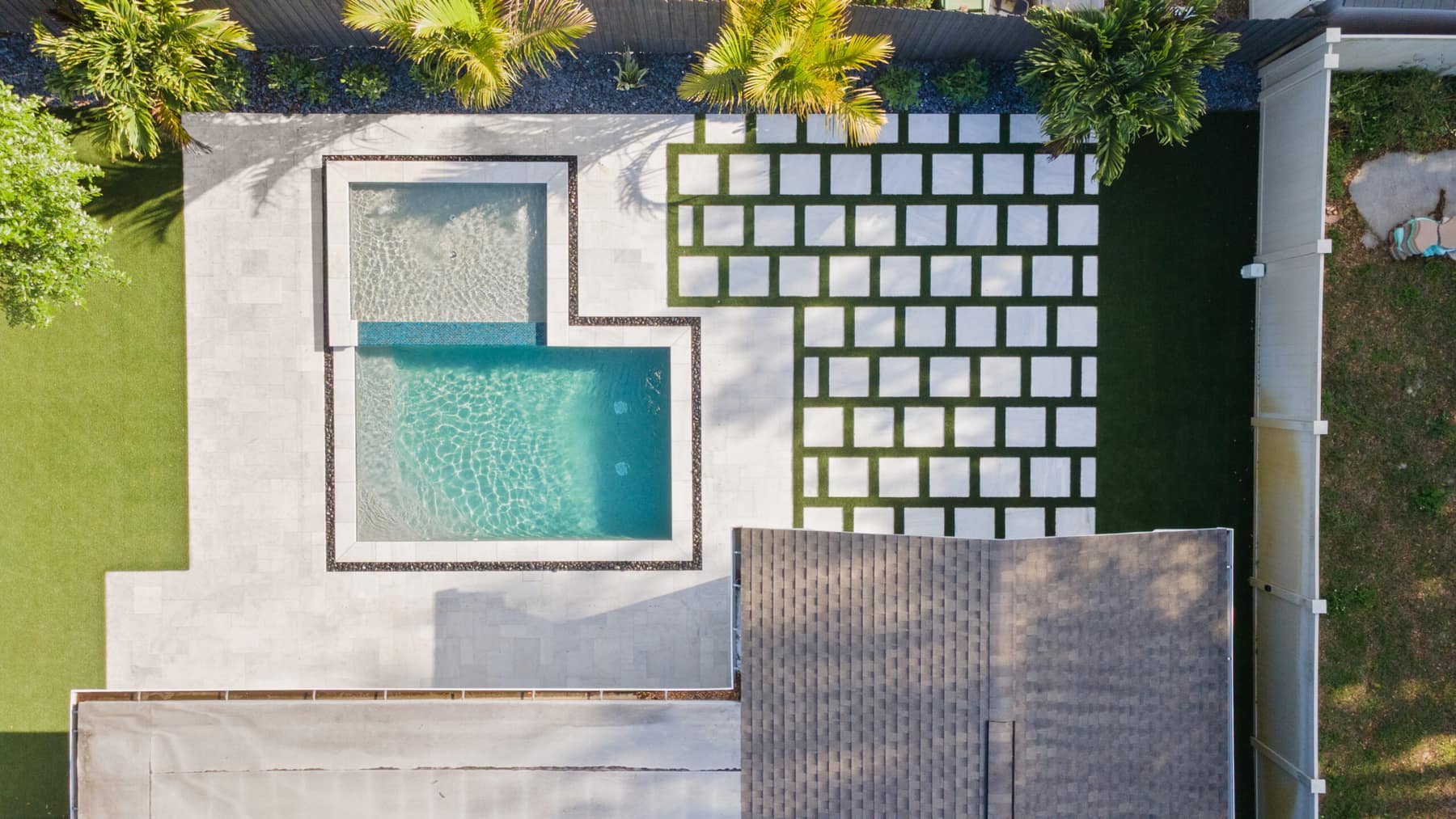 Aerial view of a custom Tampa pool fit to the lot’s setbacks and coverage limits by LIV Pools