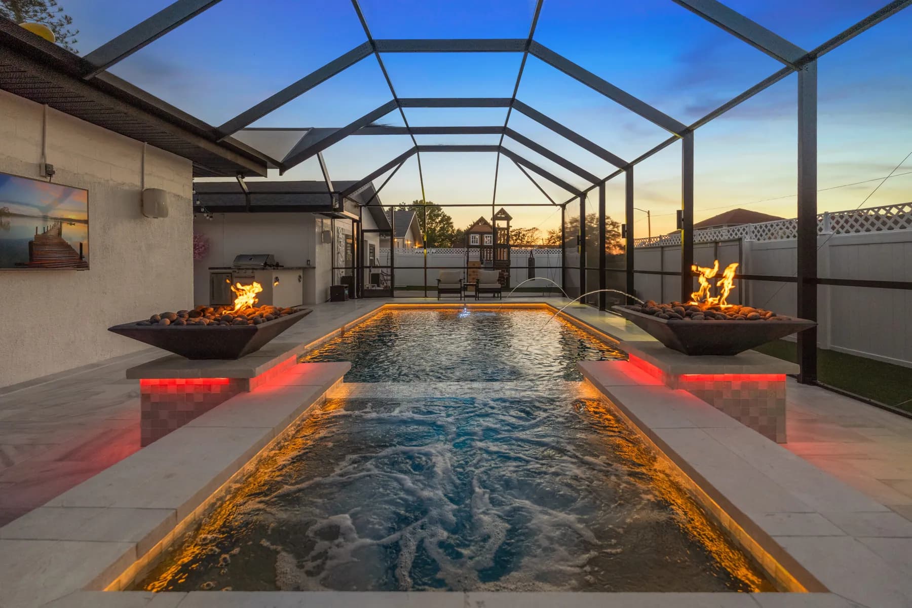 Fire & Water at Dusk — LIV Pools project in South Tampa